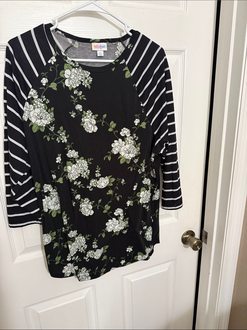LuLaRoe Black Floral Raglan Top with White Striped Sleeves